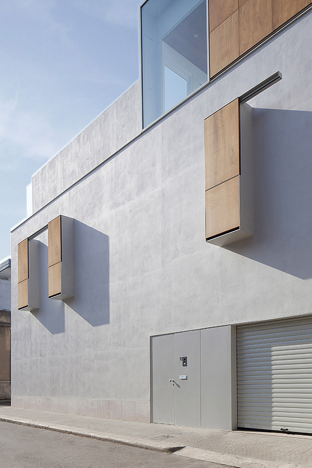 外观。三层是露台,露台扶手挡墙与建筑融为一体。 facade