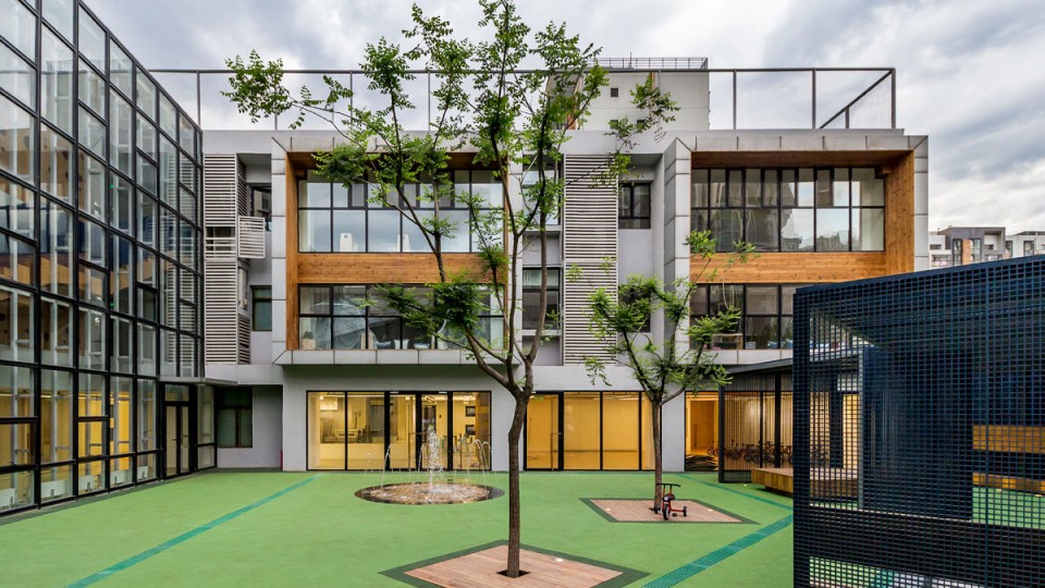 1 Central Yard_cloud Renovation of Tales CBD Kindergarten_Blue Yard by SPACEWORK Architects
