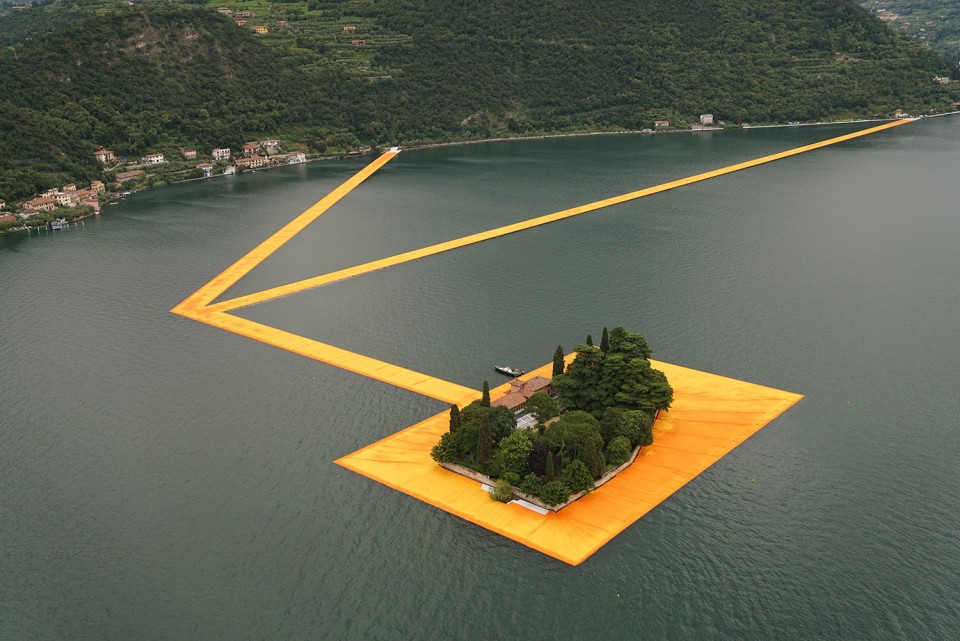 The Floating Piers - In the morning of June 16, unfurling of 1000,000 square meters of shimmering yellow fabric on the piers and pedestrian streets in Sulzano and Peschiera Maraglio is nearly completed