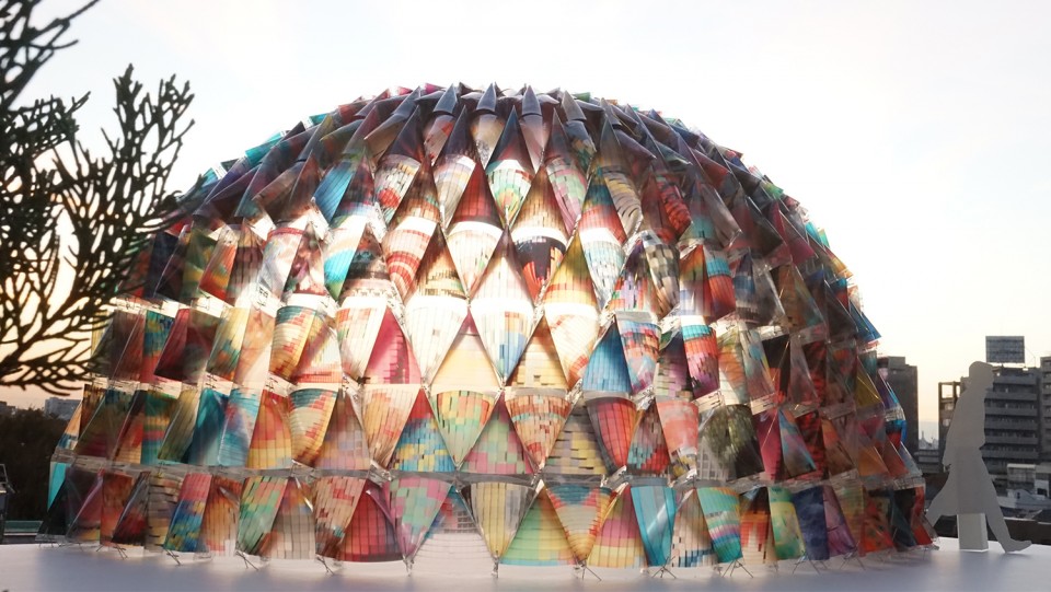 001-Colorful Mobile Fashion Store Built From Japanese Disaster Hoods by kooo architects