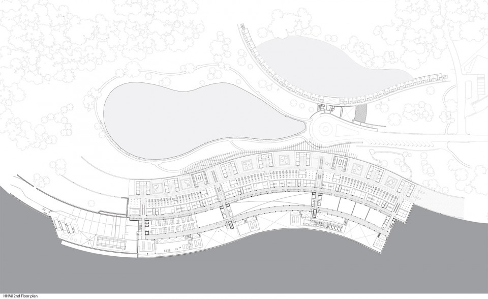 Level 2 plan. This floor is largely dedicated to the research functions. Offices are clustered in nine square modules. Laboratories are in an open and linear configuration for maximum flexibility for both use and assignment. A large area of unassigned lab support spaces will accommodate future research techniques and technologies.