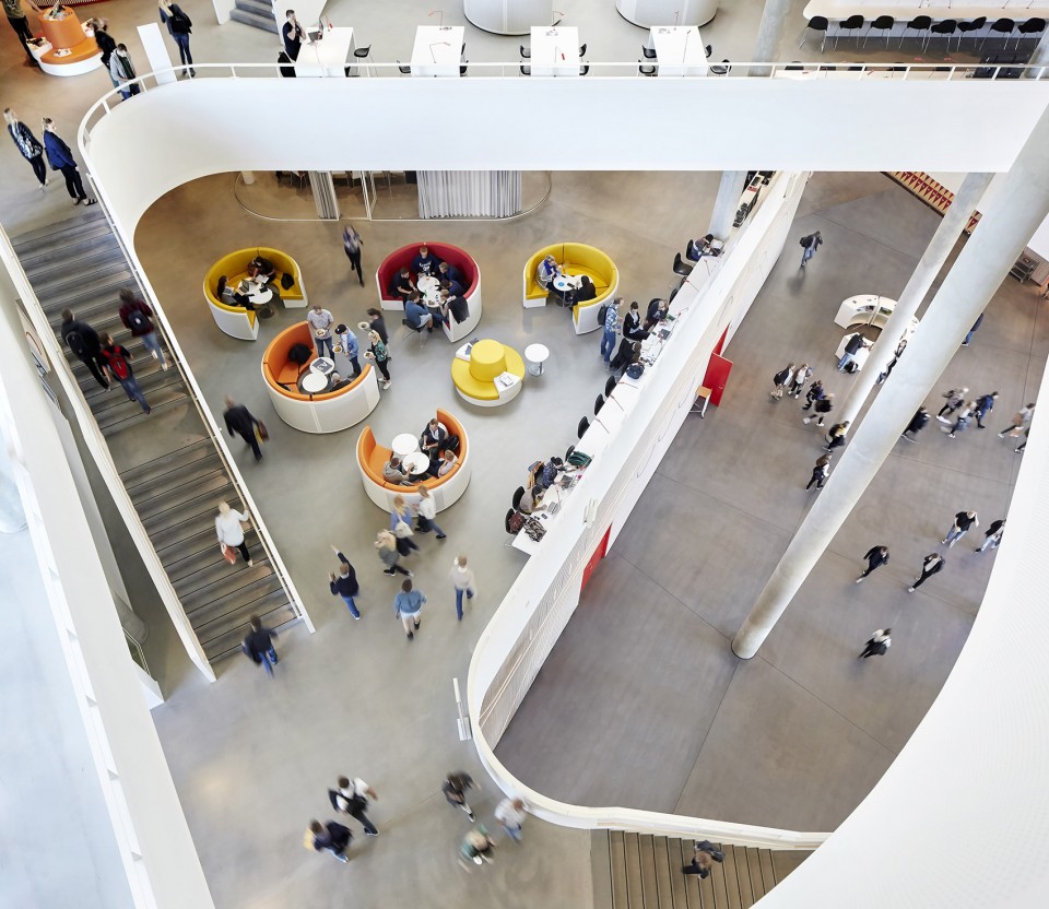 With its triangular shape, Campus Kolding of University of Southern Denmark creates a significant new landmark in Kolding. The building is located in Kolding, Denmark, and designed by Henning Larsen Architects. Photo by Hufton + Crow.