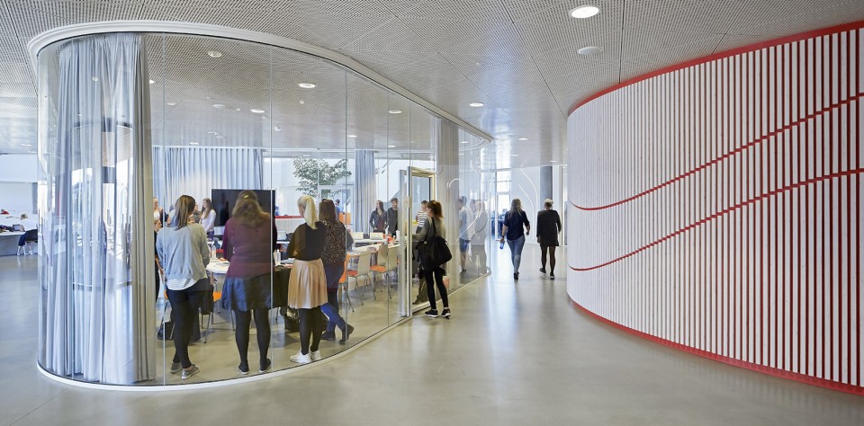With its triangular shape, Campus Kolding of University of Southern Denmark creates a significant new landmark in Kolding. The building is located in Kolding, Denmark, and designed by Henning Larsen Architects. Photo by Hufton + Crow.