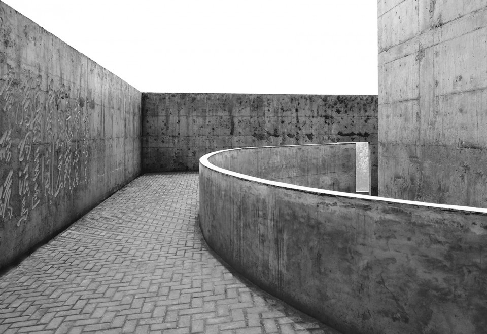 00_cover- A solitary rough concrete monument rises from destruction, China by West-line studio