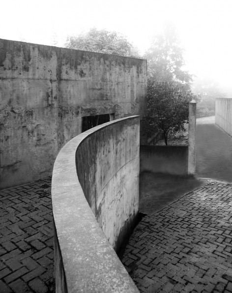 13- A solitary rough concrete monument rises from destruction, China by West-line studio