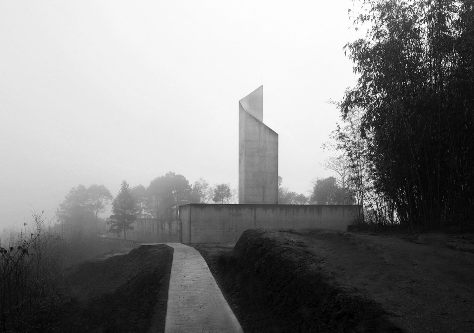 22- A solitary rough concrete monument rises from destruction, China by West-line studio