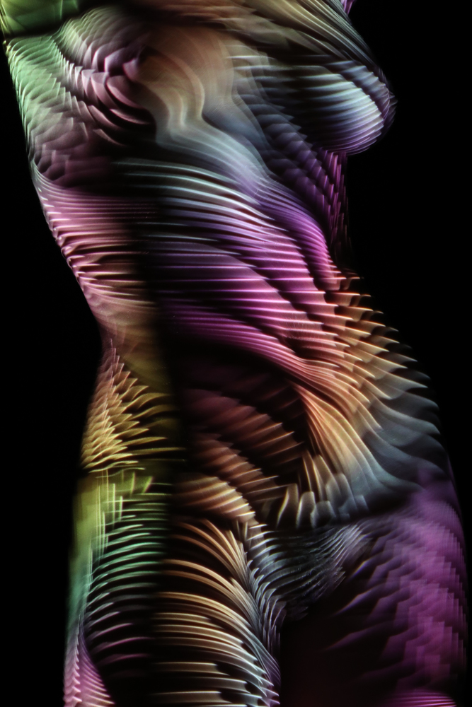 010-|surrealist portraits with light patterns by Dani Olivier