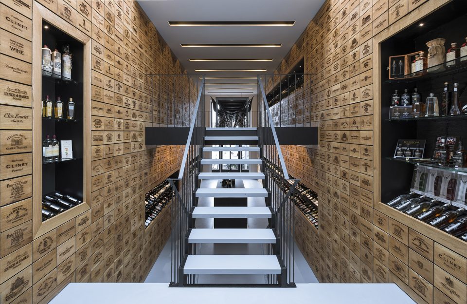 Wineshop Clad with 2100 Engraved Oak Panels