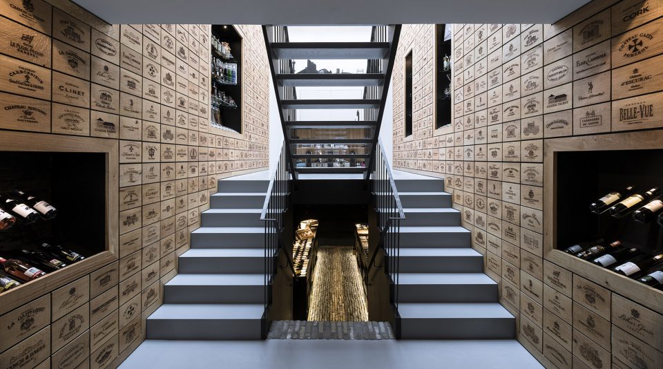 Wineshop Clad with 2100 Engraved Oak Panels