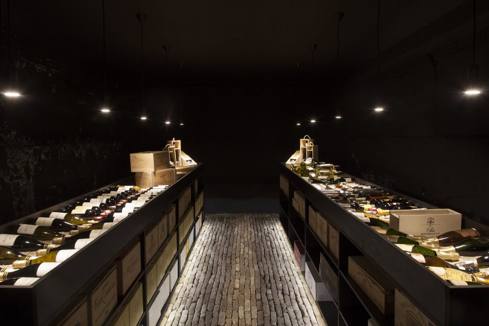 Wineshop Clad with 2100 Engraved Oak Panels