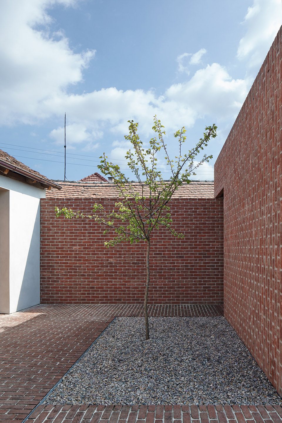 Brick Garden with Brick House By Jan Proksa