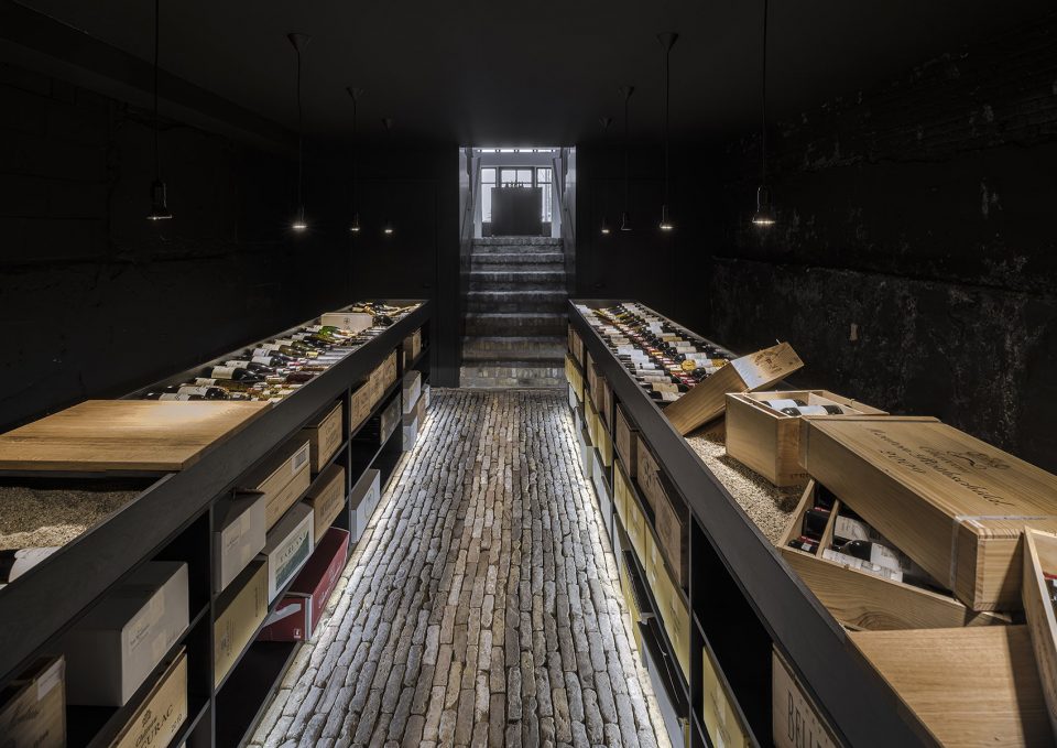 Wineshop Clad with 2100 Engraved Oak Panels