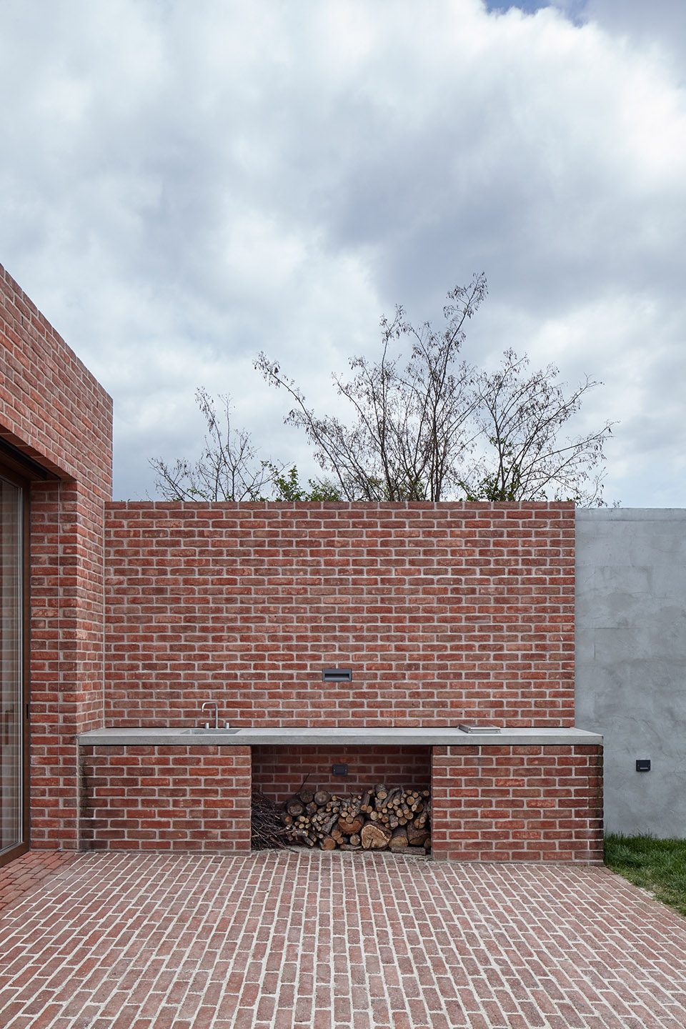 Brick Garden with Brick House By Jan Proksa