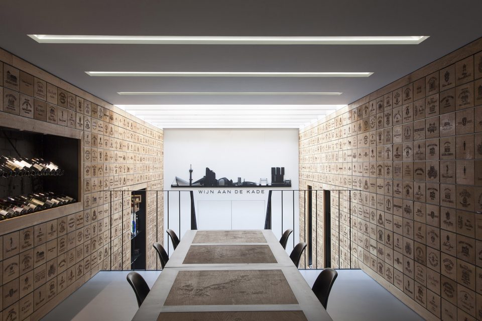 Wineshop Clad with 2100 Engraved Oak Panels