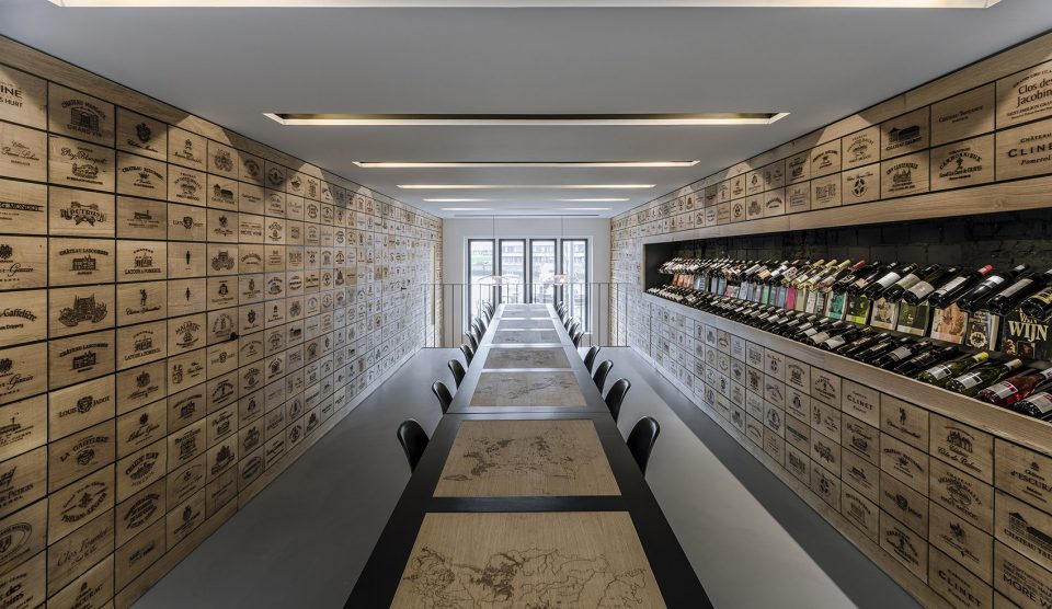 Wineshop Clad with 2100 Engraved Oak Panels