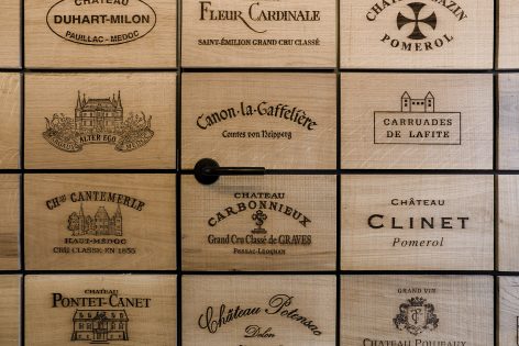 Wineshop Clad with 2100 Engraved Oak Panels