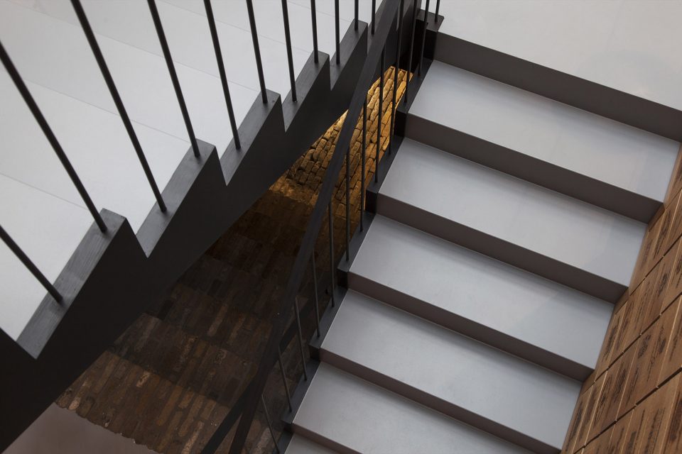 Wineshop Clad with 2100 Engraved Oak Panels