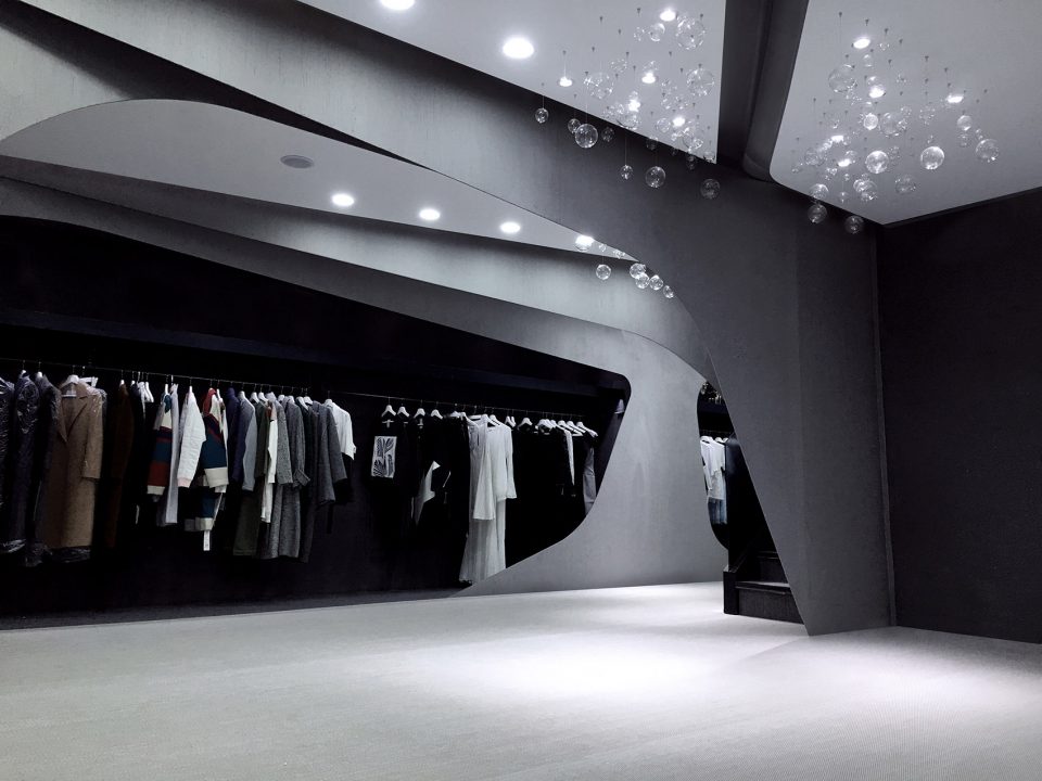 Winking Fashion Clothing Store by AND Design Group