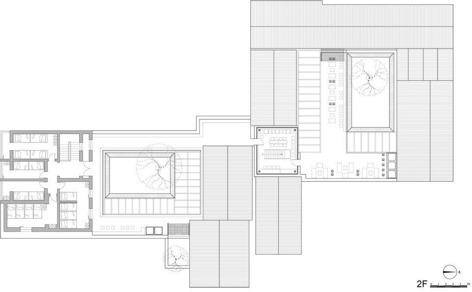 Xiezuo Hutong Capsule Hotel in Beijing by B.L.U.E. Architecture Studio