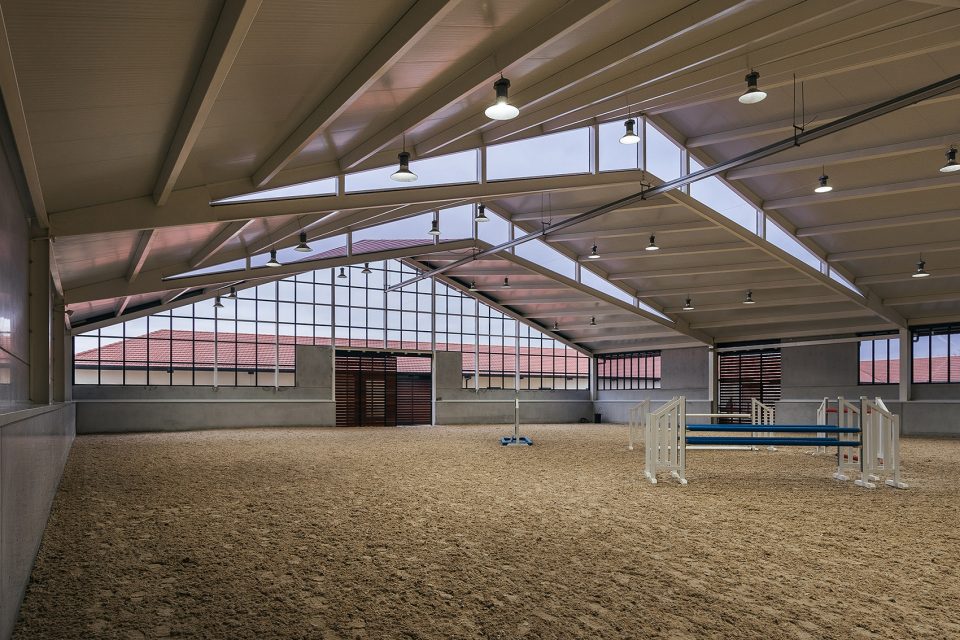 Horse Ridding Field in Cattle Farm by OOIIO Architecture