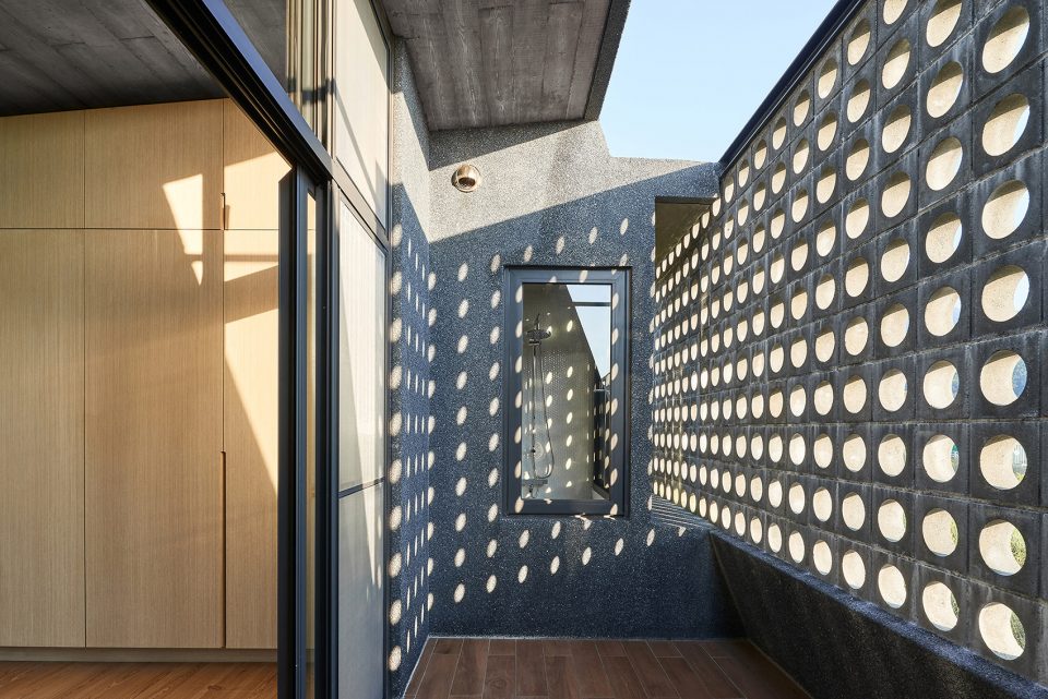 brick opening row house emerge architects