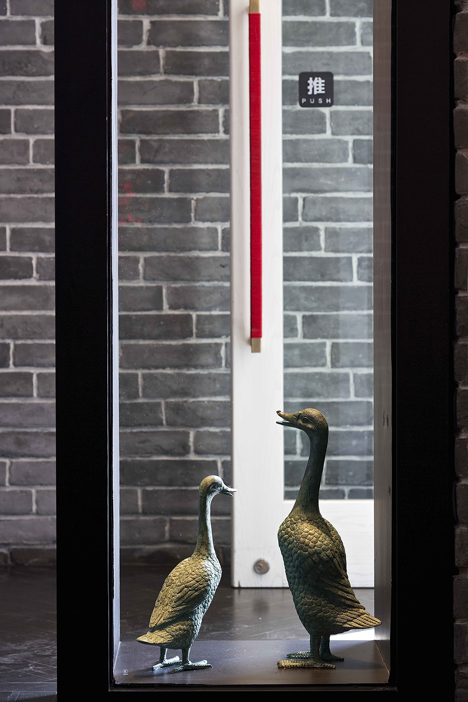 sheng yong xing roast duck restaurant in sanlitun china by tanzo space design
