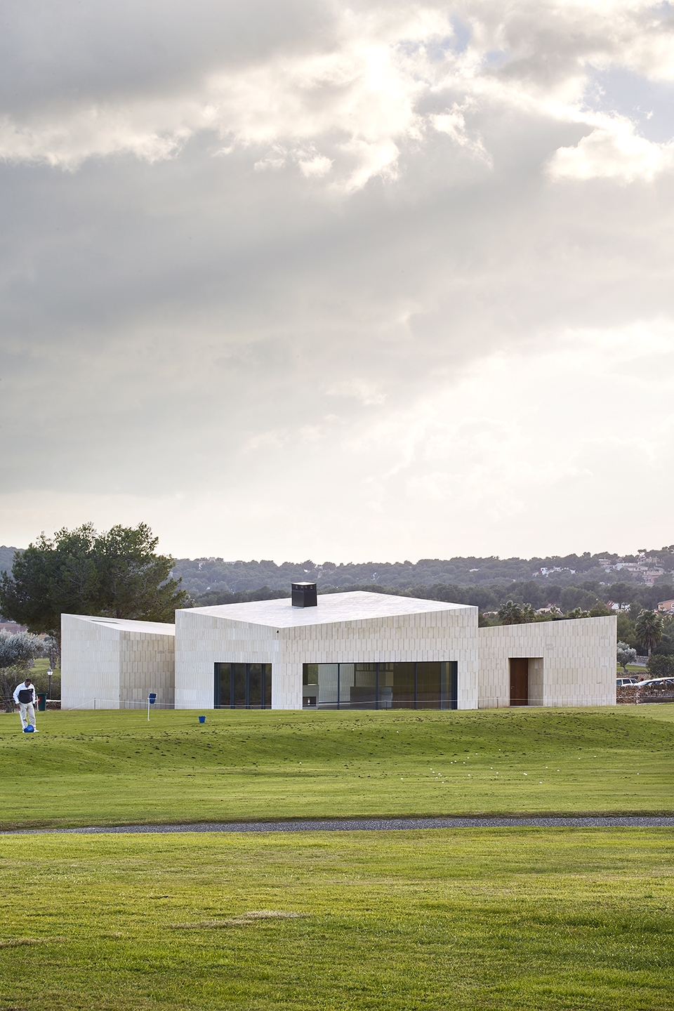 stone clubhouse by gras arquitectos