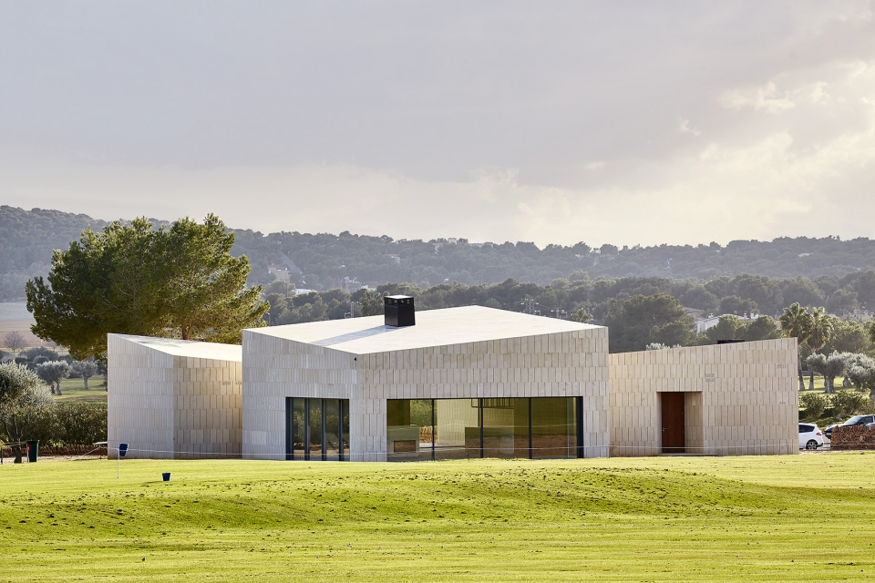 stone clubhouse by gras arquitectos