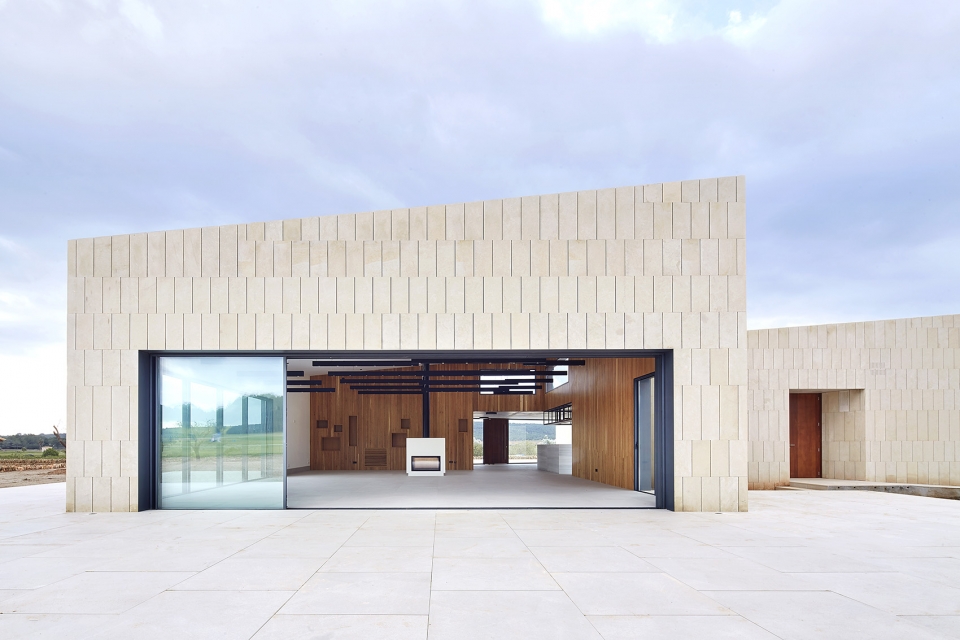 stone clubhouse by gras arquitectos