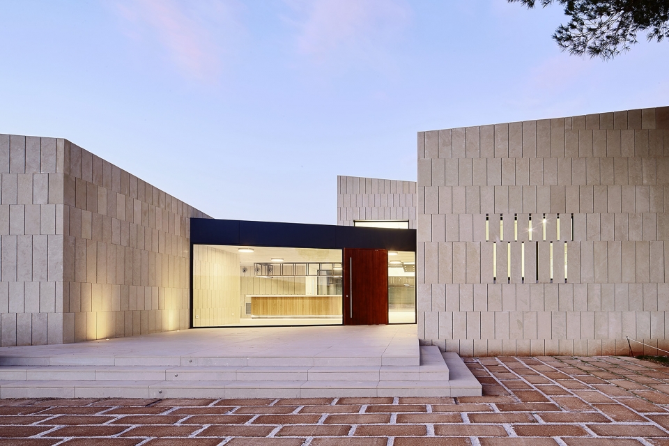 stone clubhouse by gras arquitectos