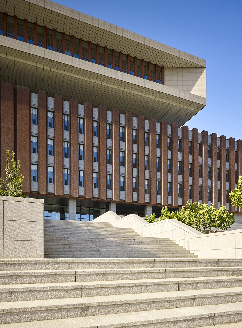 library integrated service building of nankai university new campus china by gpc of tadi