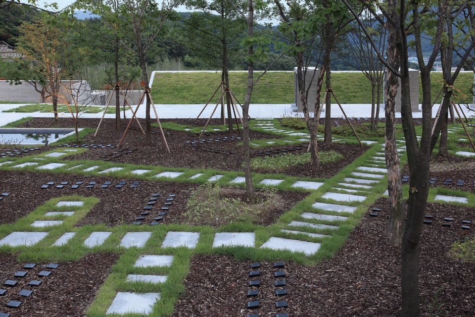 sian memorial park by iroje architects planners
