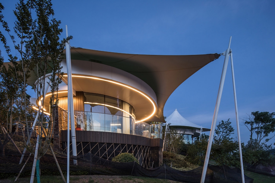 spring breeze tented hotel in shili town china by hangzhou huanting architectural engineering design co ltd