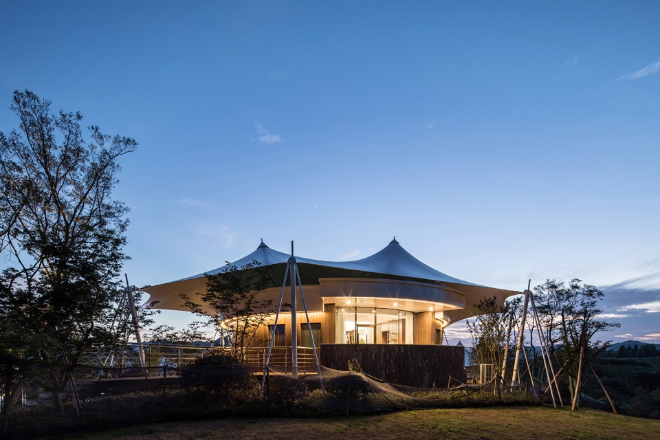 spring breeze tented hotel in shili town china by hangzhou huanting architectural engineering design co ltd