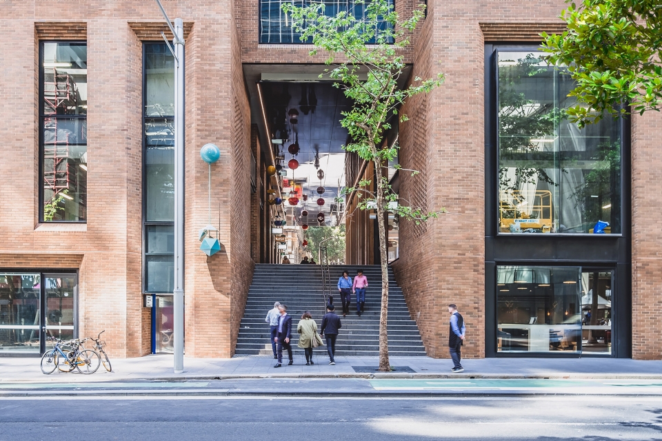 delicate and playful sculptures hang mid air in pedestrian walkway by uap