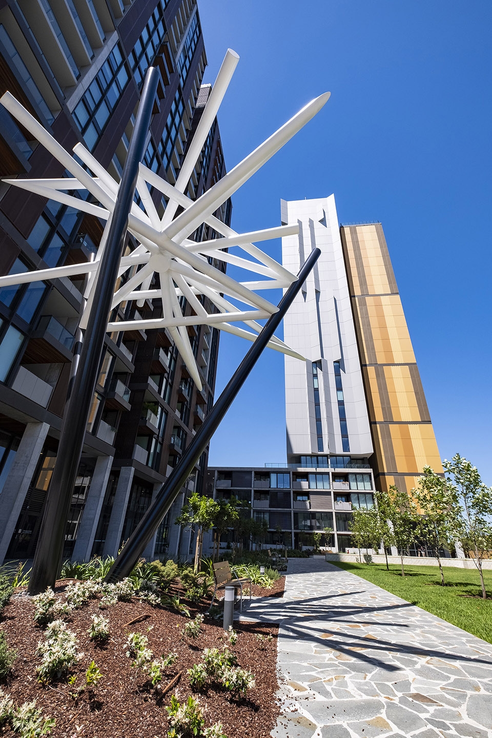 geometric sculptures tower over ryde garden by uap dion horstmans