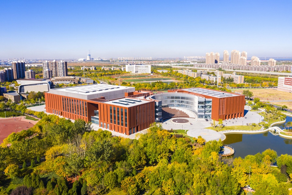 the gymnasium in tianjin university of science technology china by tao zhi studio architectural design and research institute of scut