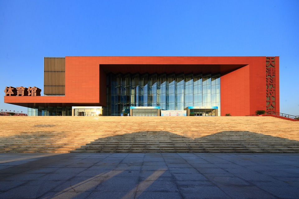 the gymnasium in tianjin university of science technology china by tao zhi studio architectural design and research institute of scut