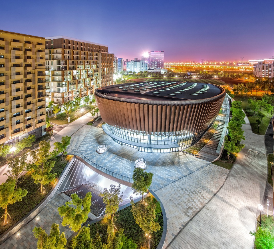 a living fish swimming in the campus design of the sports hall of shanghai university of science and technology china by tjad