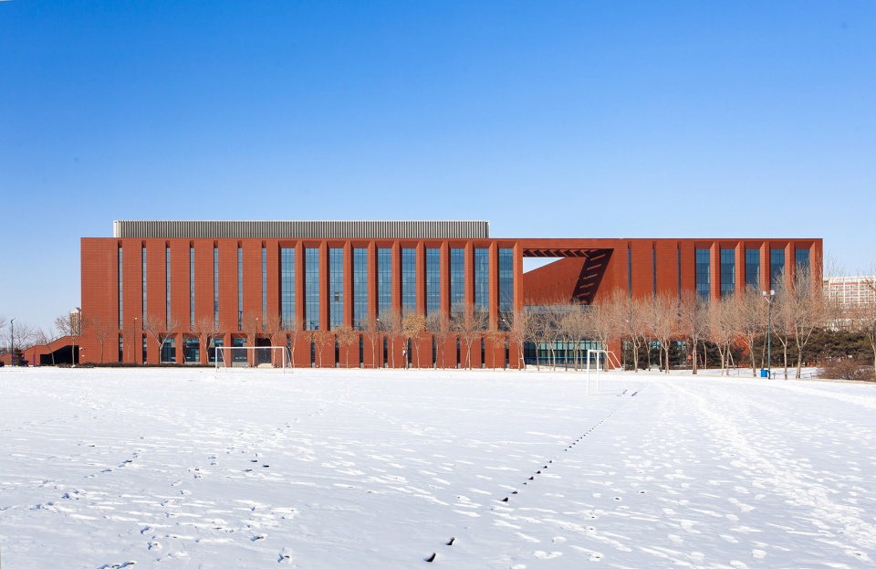 the gymnasium in tianjin university of science technology china by tao zhi studio architectural design and research institute of scut