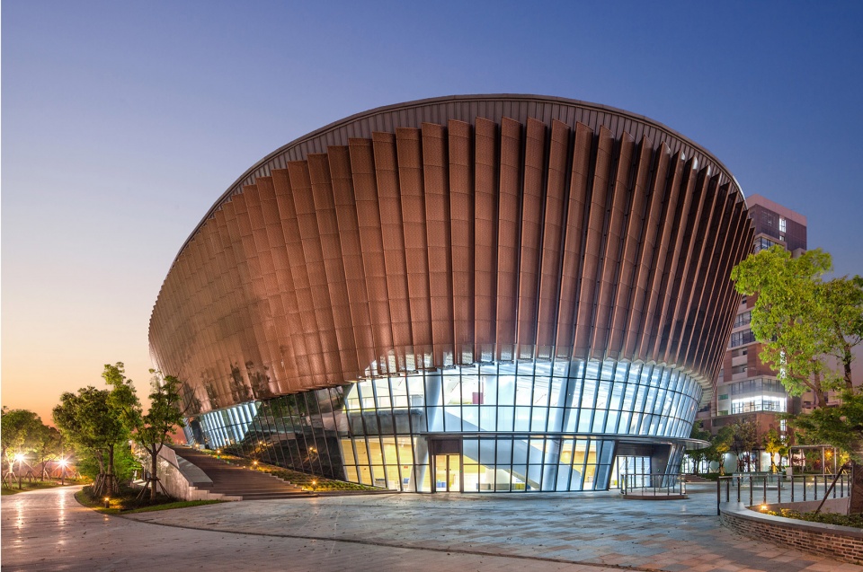 a living fish swimming in the campus design of the sports hall of shanghai university of science and technology china by tjad