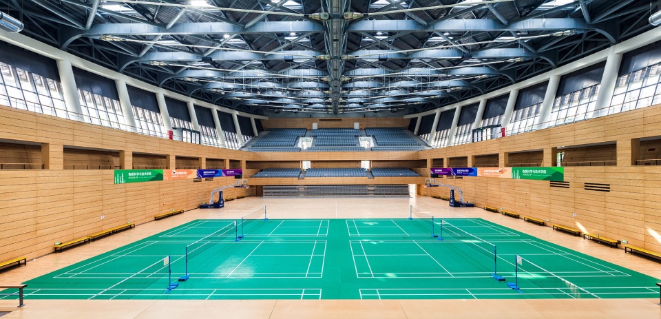 a living fish swimming in the campus design of the sports hall of shanghai university of science and technology china by tjad