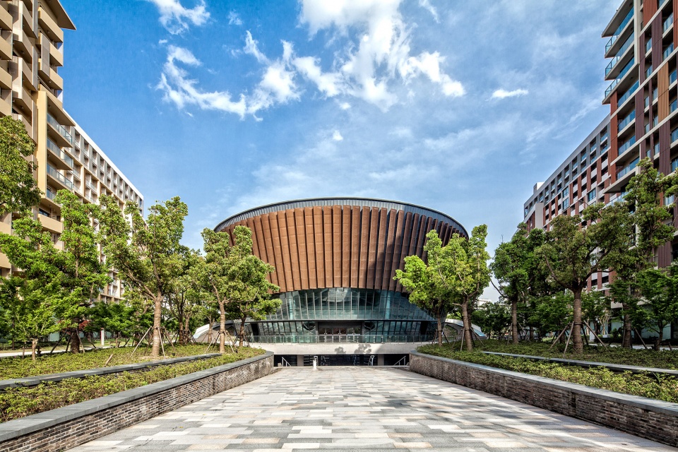 a living fish swimming in the campus design of the sports hall of shanghai university of science and technology china by tjad
