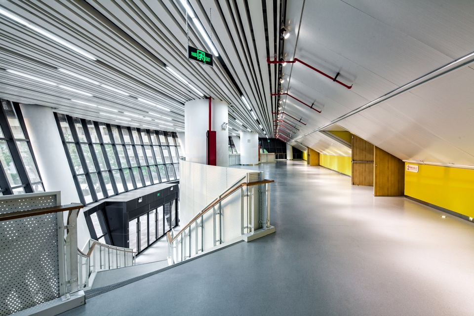 a living fish swimming in the campus design of the sports hall of shanghai university of science and technology china by tjad