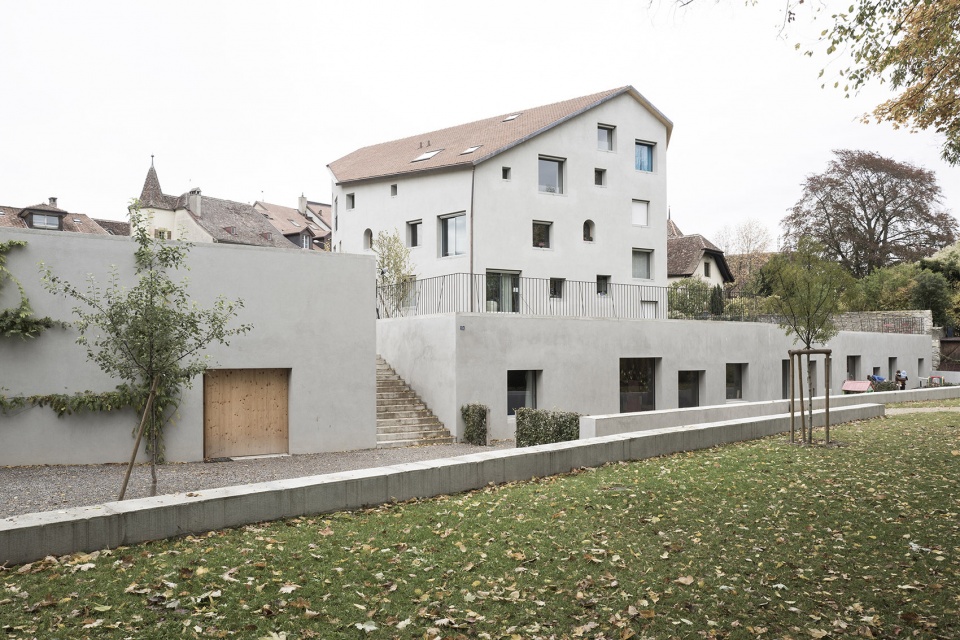 construction of a residential building a community space and a nursery in auvernier by frundgallina