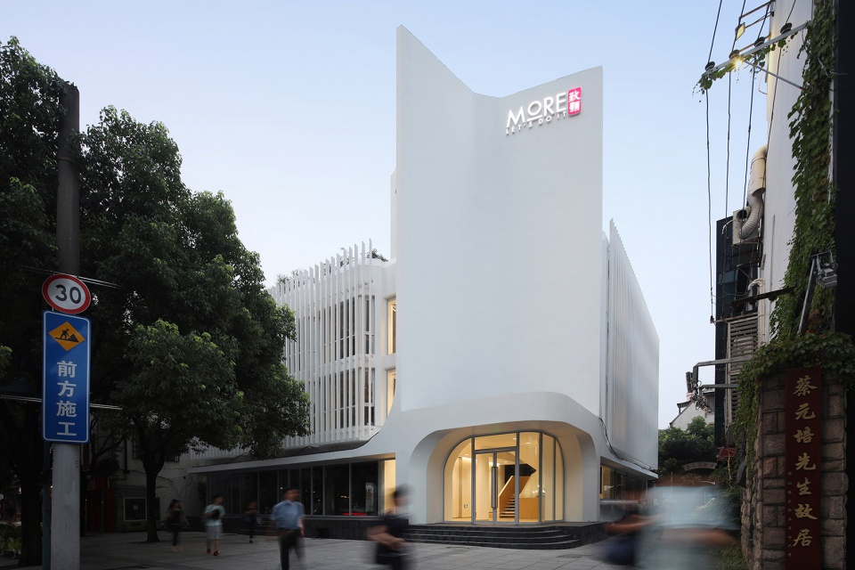 soften the presence renovation of jingan business building china by archunits