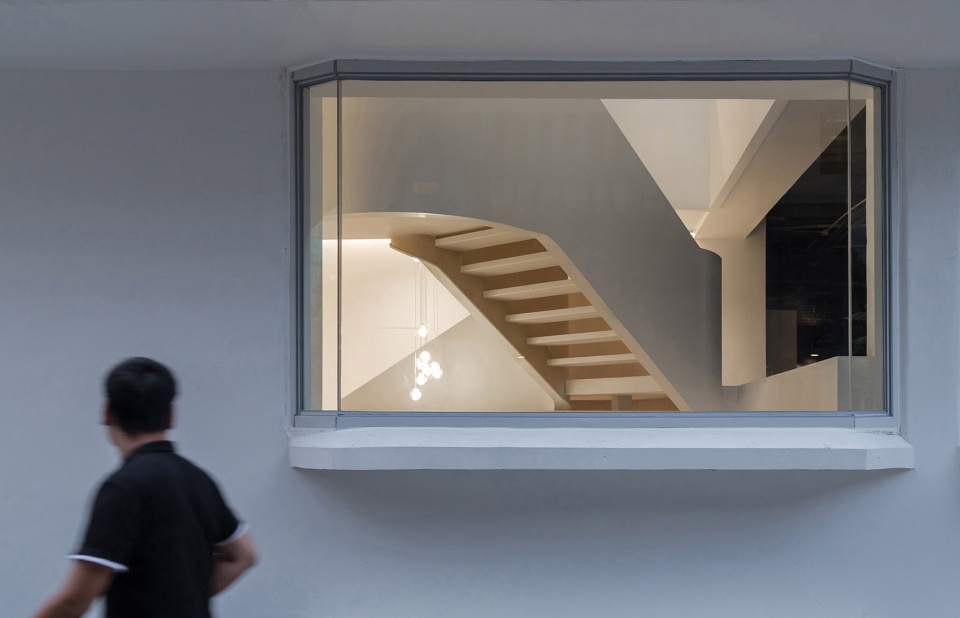 soften the presence renovation of jingan business building china by archunits