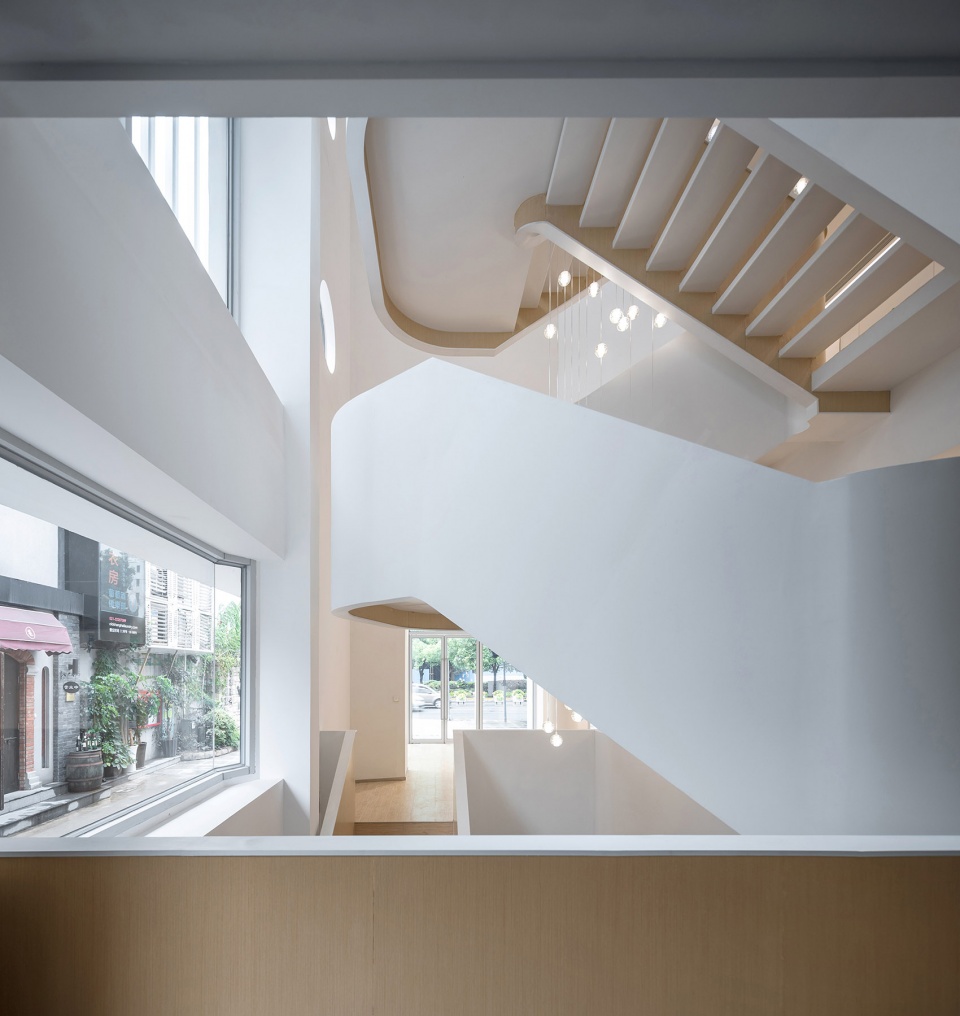 soften the presence renovation of jingan business building china by archunits
