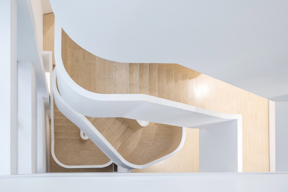 soften the presence renovation of jingan business building china by archunits