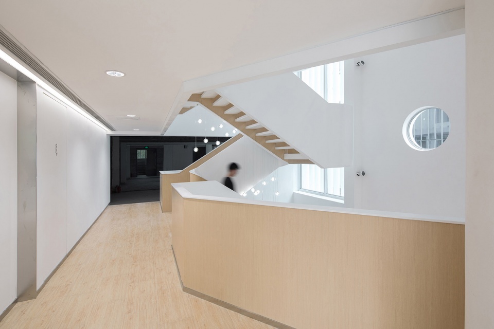 soften the presence renovation of jingan business building china by archunits